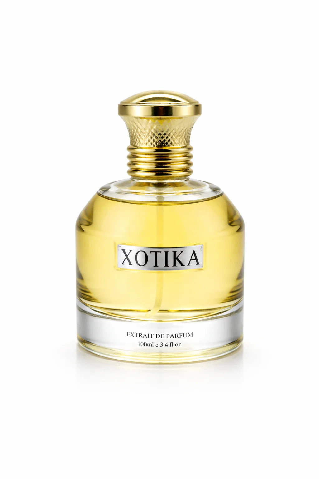 A 100ml bottle of XOTIKA Extrait de Parfum with a gold cap and a gold liquid inside, set against a plain white background.